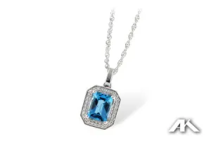 14K White Gold Emerald Cut Blue Topaz and Diamond Halo Necklace