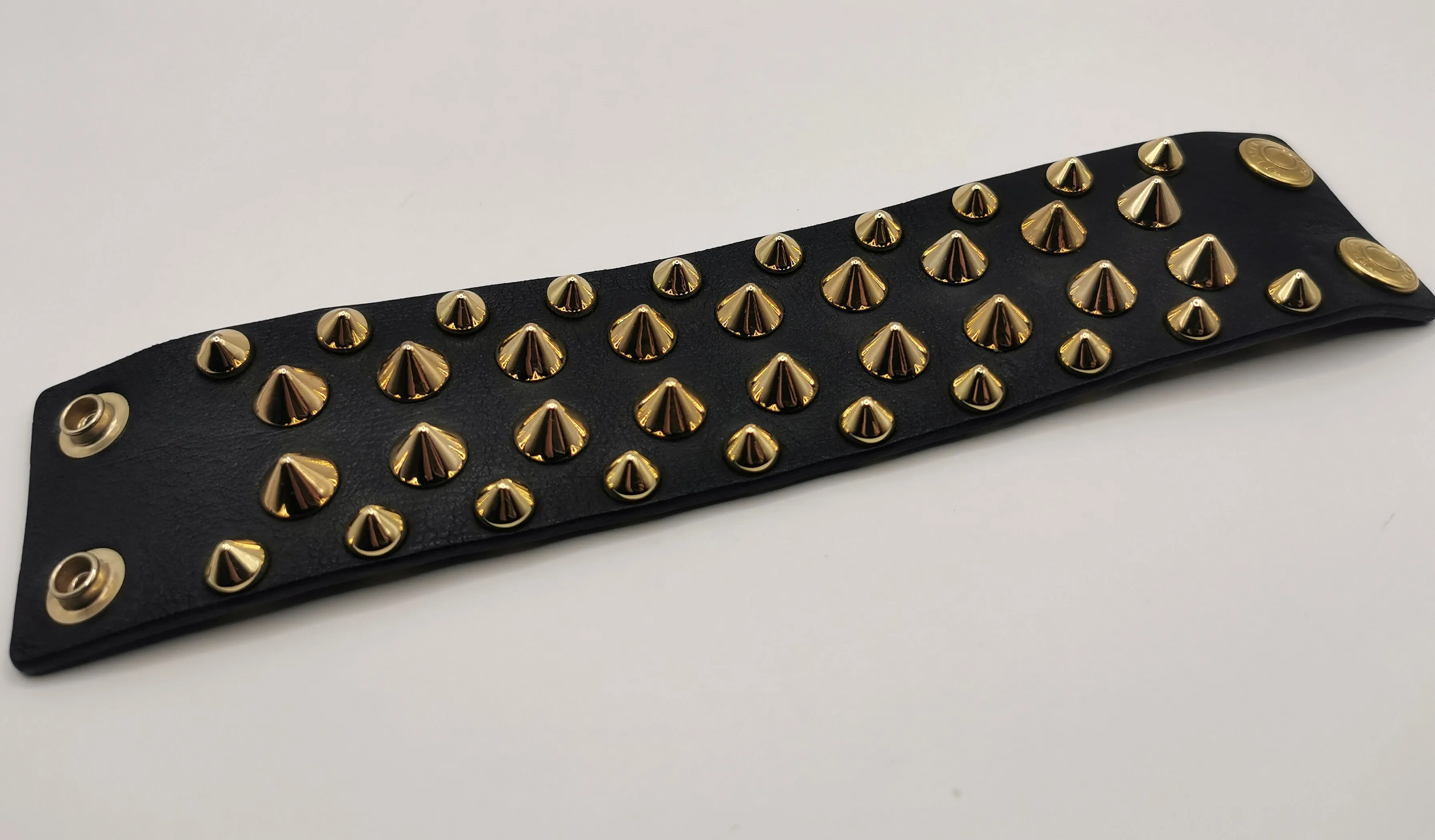 Balmain studded leather cuff bracelet, black and gold