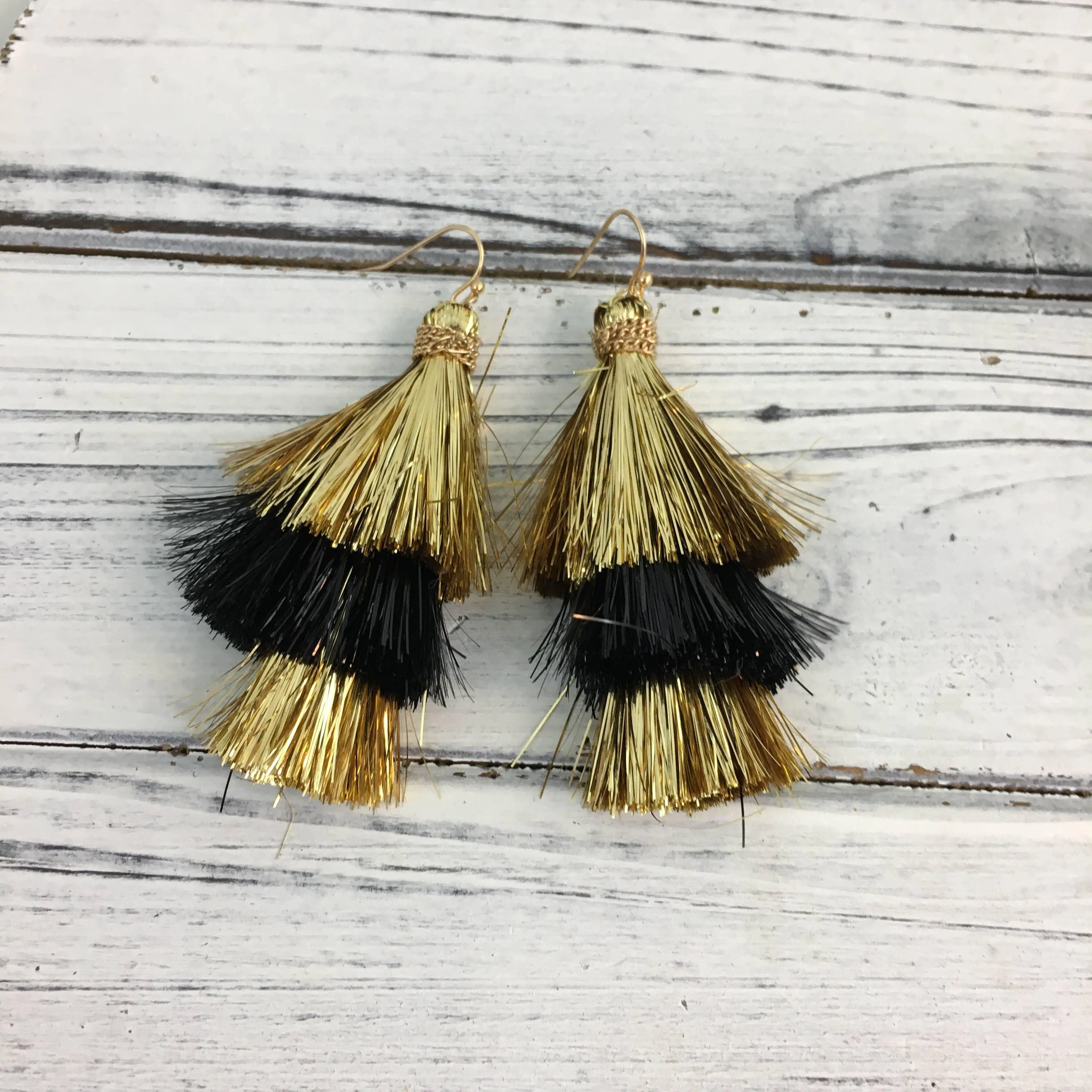 Black and gold tinsel tassel earrings