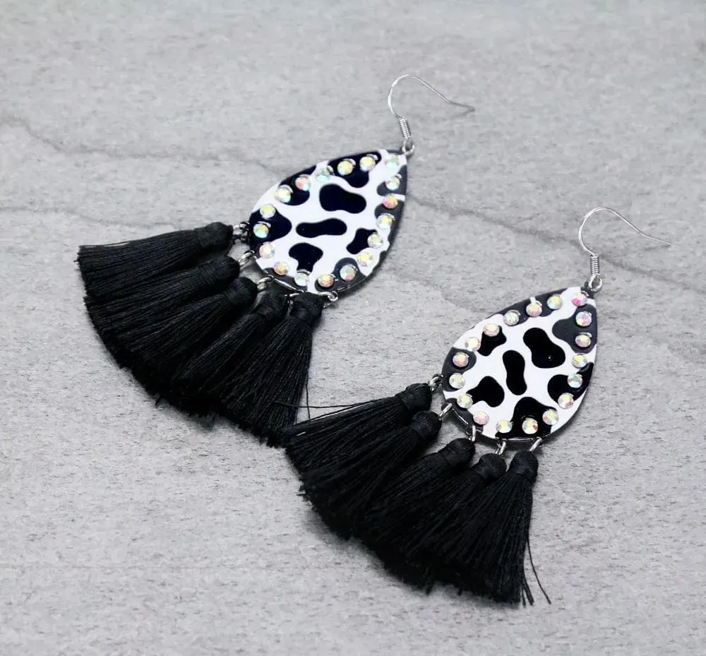 Black cow tassel earrings