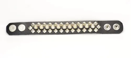 Black leather bracelet w/ 1 row of silver tree spikes and 2 rows of diamond shaped silver studs