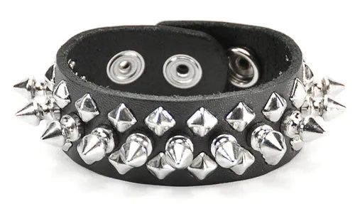 Black leather bracelet w/ 1 row of silver tree spikes and 2 rows of diamond shaped silver studs