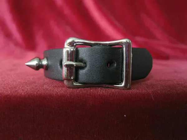 Black leather bracelet w/ single row of silver spikes