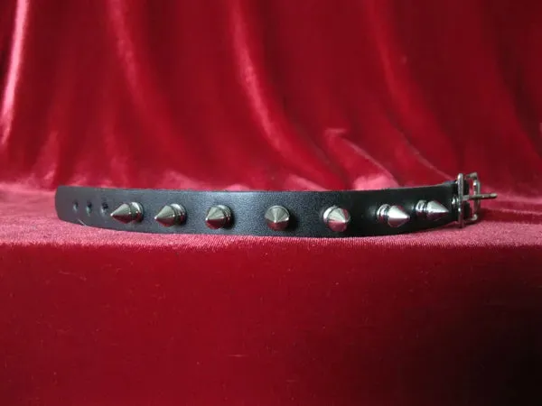 Black leather bracelet w/ single row of silver spikes