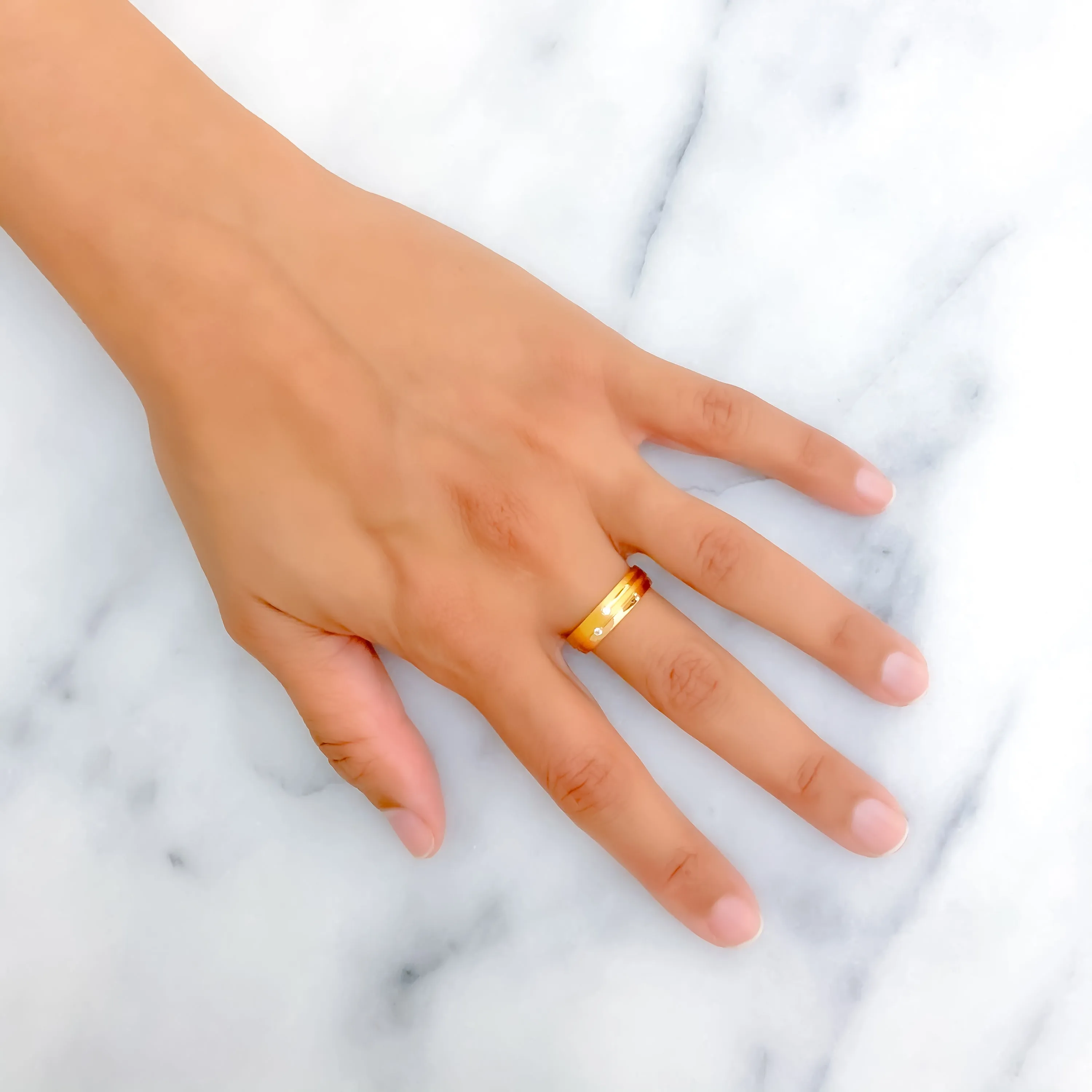 Elegant Sparkling 21k Gold CZ Band