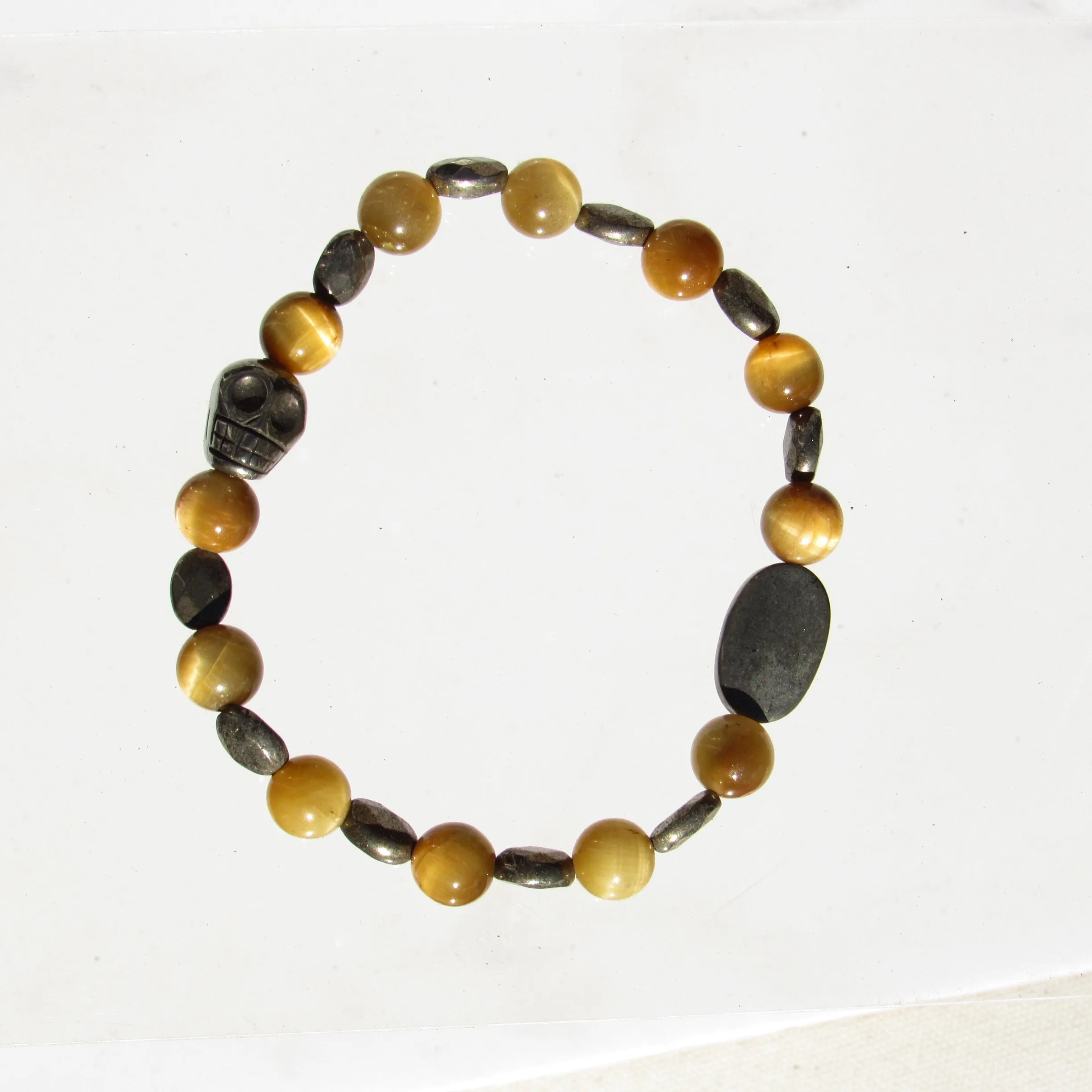 Tiger Eye gemstone and Pyrite skull beaded stretch bracelet
