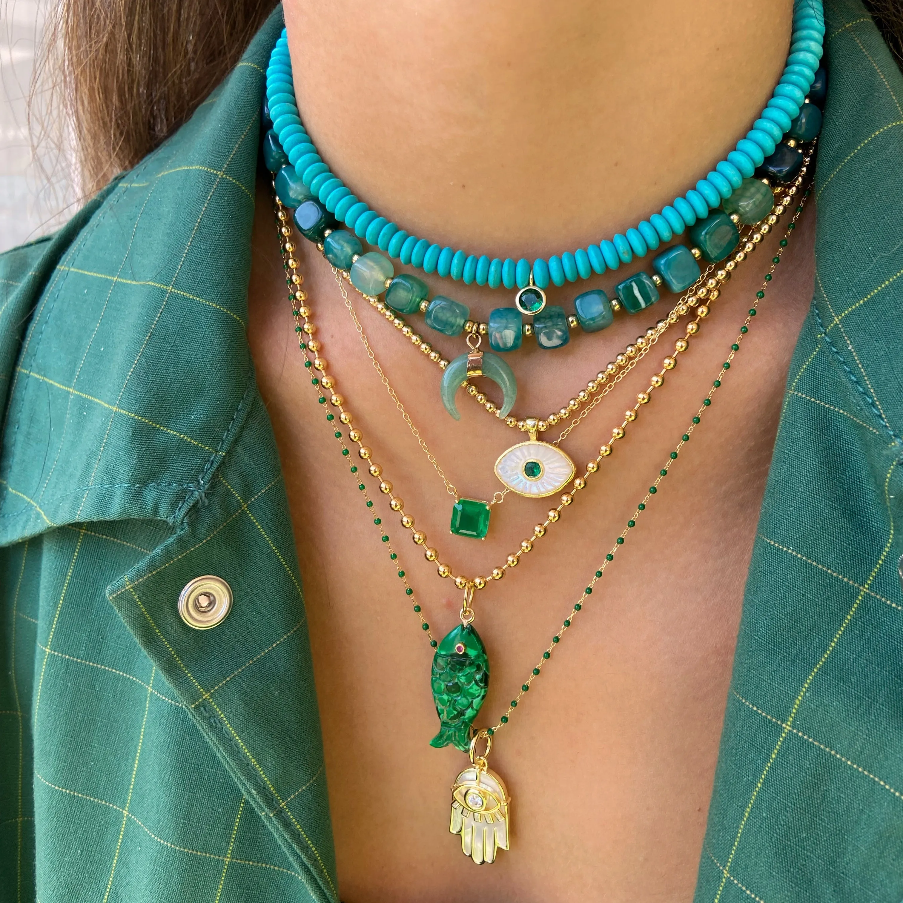 Turquoise Puka with Emerald Bezel